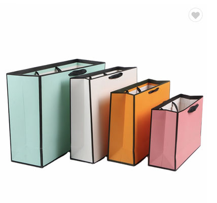 Un bon prix. 2022 Gros magasinage sacs en papier à large gaufre Pantone sacs cadeaux en papier de couleur en ligne