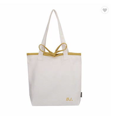 Un buen precio. 16 oz No tejido de lienzo simple bolsas de bolsa de compras reutilizables Logotipo impreso en línea